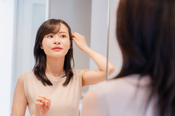 istock Young woman getting ready in the morning 2128051376