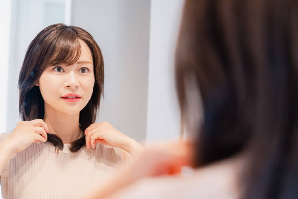 istock Young woman getting ready in the morning 2128051379