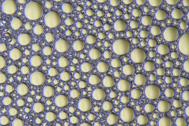 Abstract green macro background with lots of soap bubbles