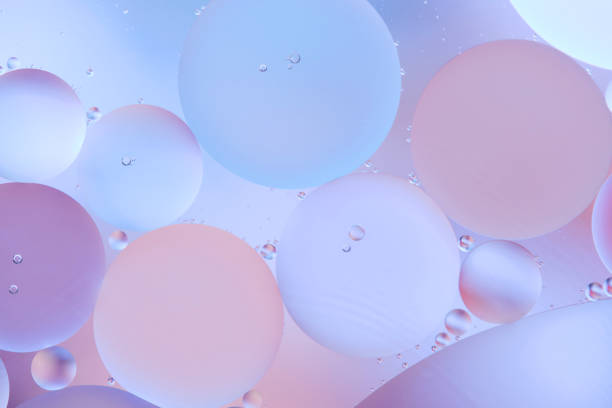 istock Abstract background with pastel colors with oil circles water surface. 2128063971