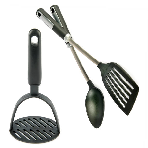 istock Kitchen spatula, spoon and potato masher isolated on white. Collage. 2128070817