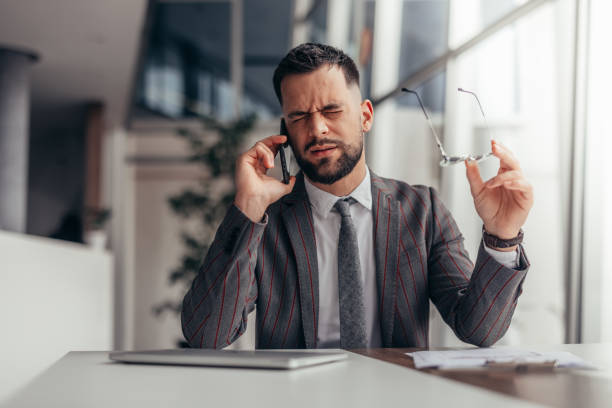 istock Worried and Exhausted Businessman 2128080599