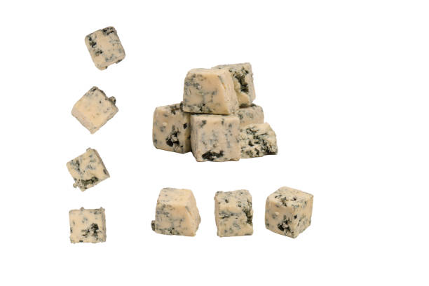 istock Blue cheese cubes isolated on a white background. 2128084255