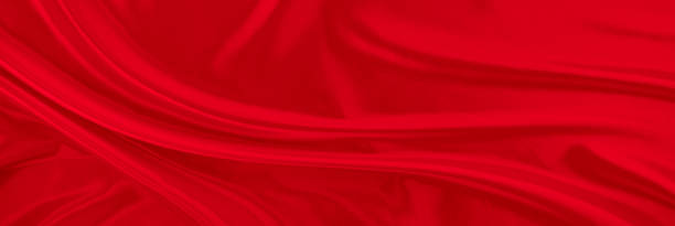 istock Black red satin dark fabric texture luxurious shiny that is abstract silk cloth background with patterns soft waves blur beautiful 2128086499