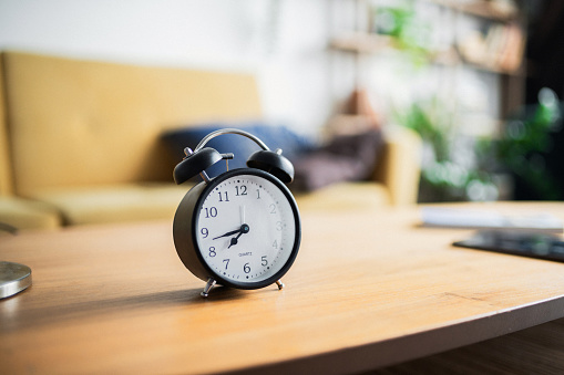 Retro alarm clock on the table