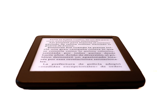 Open electronic book resting on a table ready for someone to read it