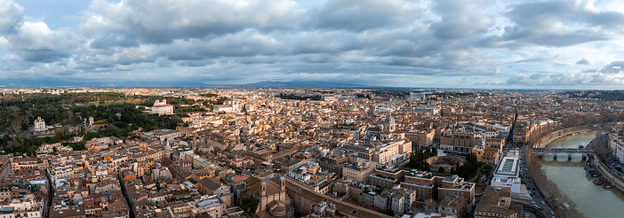 Aerial view of Rome city center from above. Beautiful panoramic sunset view over Roma.