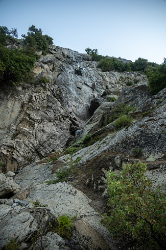 Thin Waterfall Tumbles Down Snow Creek Trail In Yosemite National Park