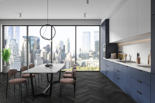 istock Modern home kitchen interior with cabinet and eating table, panoramic window 2128271297