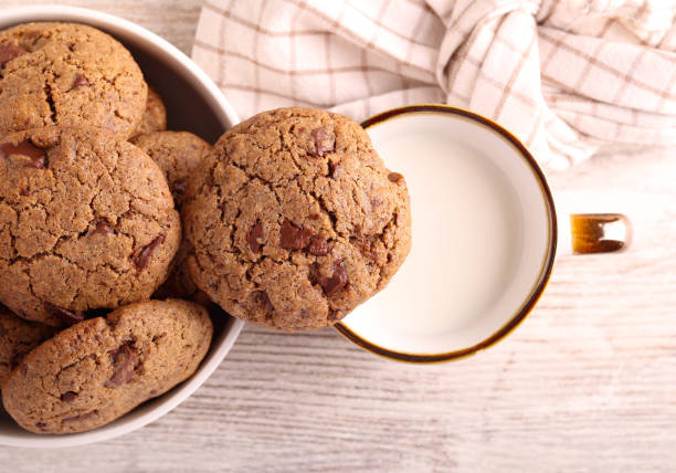 Buckwheat cookies with chocolate served with cup of milk