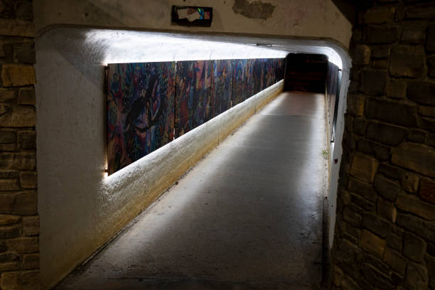Traverse City, Michigan USA - August 30, 2023: An illuminated pedestrian tunnel lit for evening pedestrians walking in Traverse City Michigan.