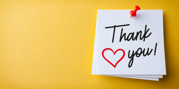 istock White Sticky Note With Thank You And Red Push Pin On Yellow Cardboard 2128290650