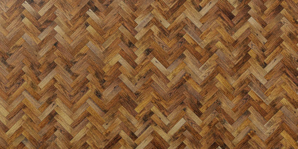 istock Seamless wood parquet texture herringbone light brown. 3D render 2128359992