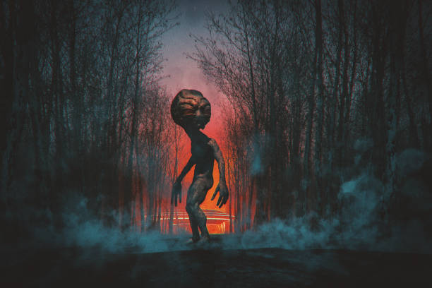 istock Alien UFO crash site in the forest at night 2128410823