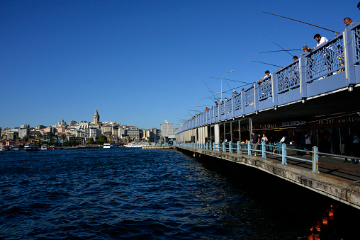Istanbul, Turkey - September 7, 2022: Golden Horn - Galata Bridge over the Golden Horn has two levels