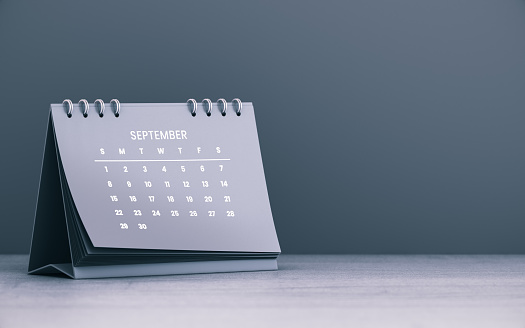 2024 September Monthly Desktop Calendar on Wooden Background. Selective Focus Calendar. 3d rendering stock photo