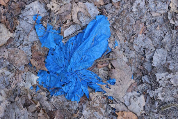 istock garbage from pieces of old blue cellophane from a plastic bag 2128583367