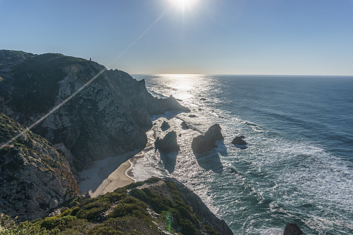 Rock formation at atlantic ocean coast on westernmost point, Cape Roca, Cabo da Roca, Portugal.