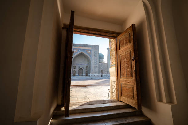 istock Registan Square, complex of three madrasah. Medieval university campus. Sunny morning. view from the door 2128676174
