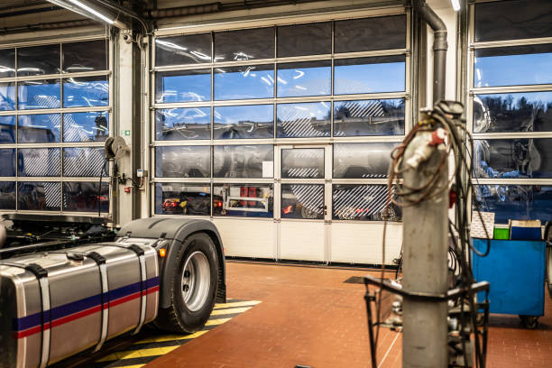 istock Garage for maintenance of trucks 2128680508