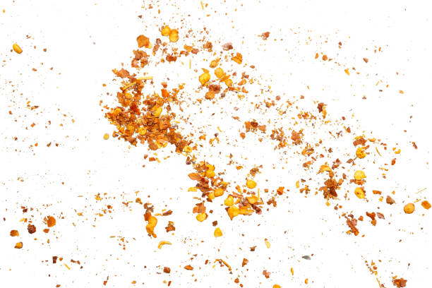 istock dried red chili pepper flakes and seeds isolated on white background 2128681611