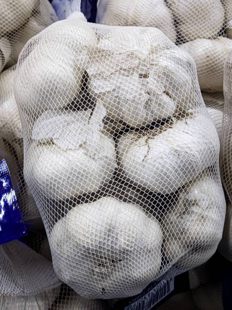istock A sack of garlic. 2128703034