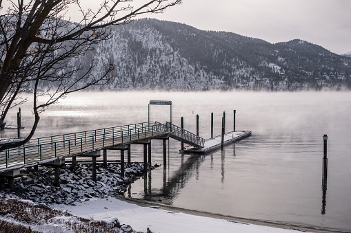 Mist rises from Lake Chelan around the Manson Pier and Jetty during a winter cold snap
