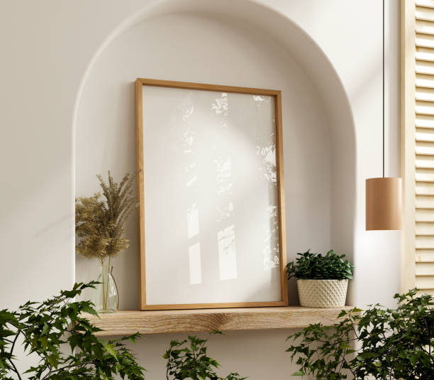 istock Poster frame mockup with vertical wooden frame in home interior background 2128764906
