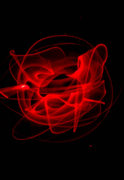 istock Red light painting, long exposure photography, ripples and round pattern 2128774574
