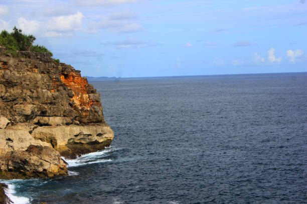 istock rock formation at the beach 2128856402