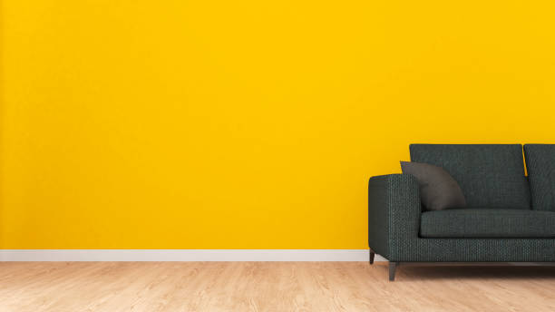 istock Yellow wall with wooden floor and sofa.,A mockup for inserting text or images.,3d rendering 2128859948