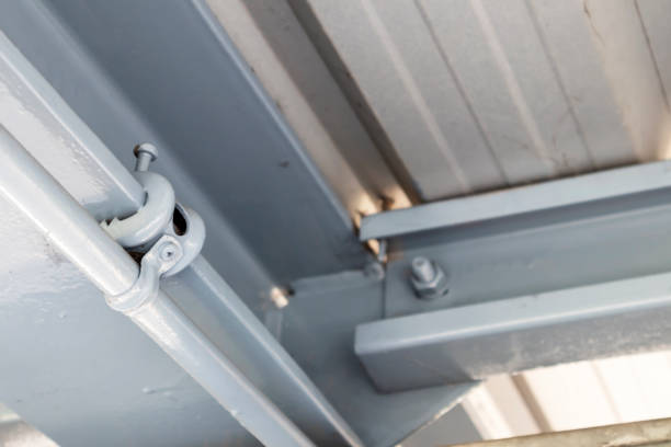 istock Nuts are attached to steel structures in construction. 2128864584