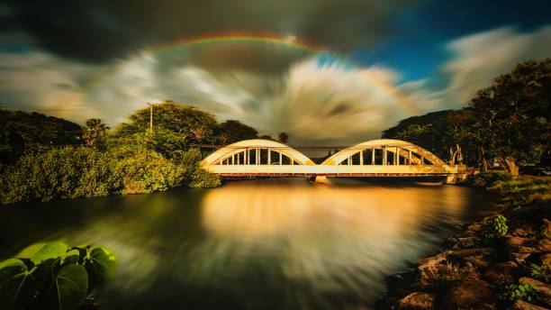 istock Scenery of Haleiwa bridge with rainbow background 2128911443
