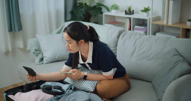 istock The young woman was checking her baggage again. 2128928996