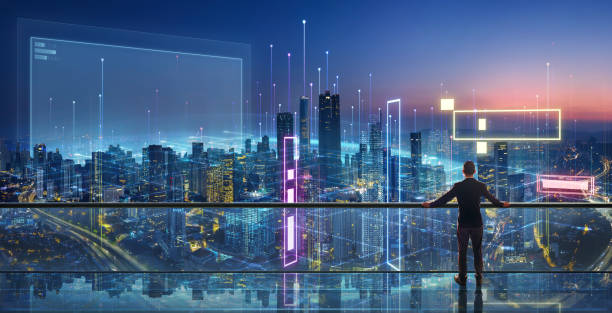 istock Man standing in front of smart cityscape 2128962629