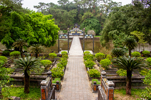 Traditional Copper Gate And Thong Minh Chinh Truc Bridge Connect To Minh Mang Tomb At Mausoleum Of Minh Mang Area, Vietnam.