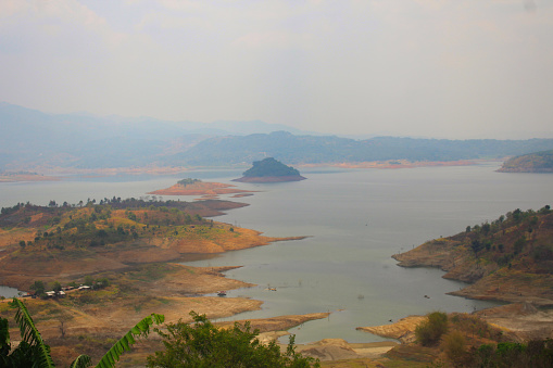 view of the receding water at the Jatigede Dam in Sumedang during the dry season