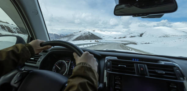 istock Driving car on the high altidue road, China 2129012146