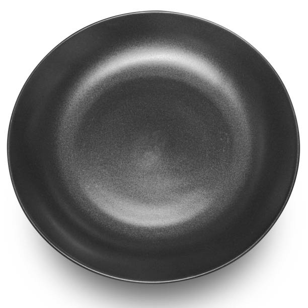 istock Black circle ceramics plate isolated on white background. 2129016242