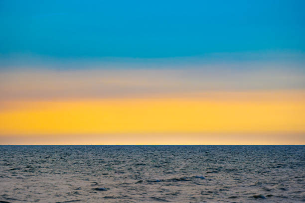 skyline scenery Sunset in the evening sky with colorful clouds and beautiful cloud patterns In the soft light Evening at the sea