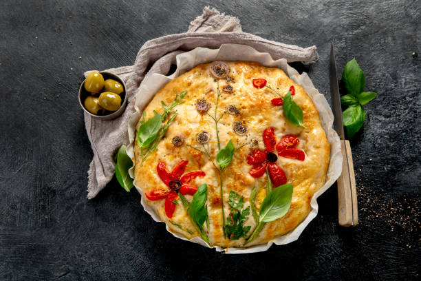 istock Focaccia art. Italian bread on dark background 2129215996
