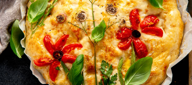 istock Focaccia art. Italian bread on dark background 2129216507