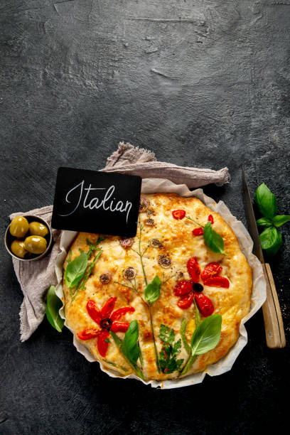 istock Focaccia art. Italian bread on dark background 2129217016