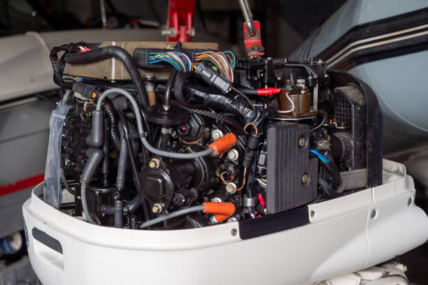 istock repairing the outboard engine in workshop. 2129218041