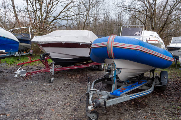 istock two motor boats on trailers at parking 2129223794