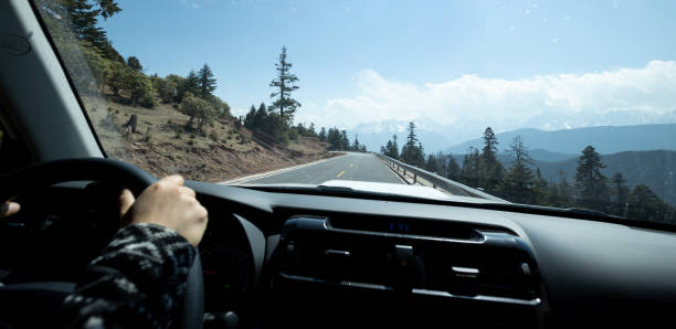 istock Driving car on the high altidue road, China 2129241610