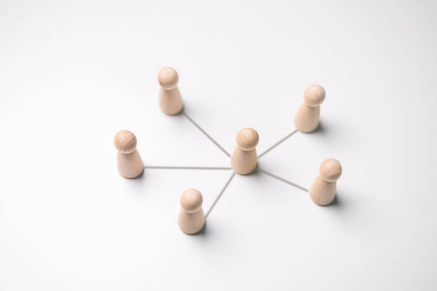 istock Circle of people interconnected by lines. cooperation, teamwork, training. Staff, community meeting. Collaboration and cooperation, participation. Social connections, joining to solve tasks 2129244243