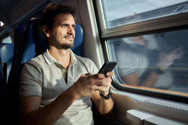 istock Young male tourist traveling by subway train 2129252548