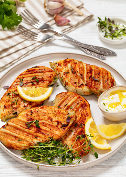 istock juicy grilled chicken cutlets on plate, top view 2129273762
