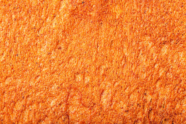 Ruddy crust of bread as an abstract background. Texture.